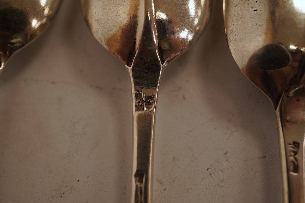 A group of twelve assorted Georgian silver base mark rat tail teaspoons, various dates and makers, indistinct marks, 4.4oz.
